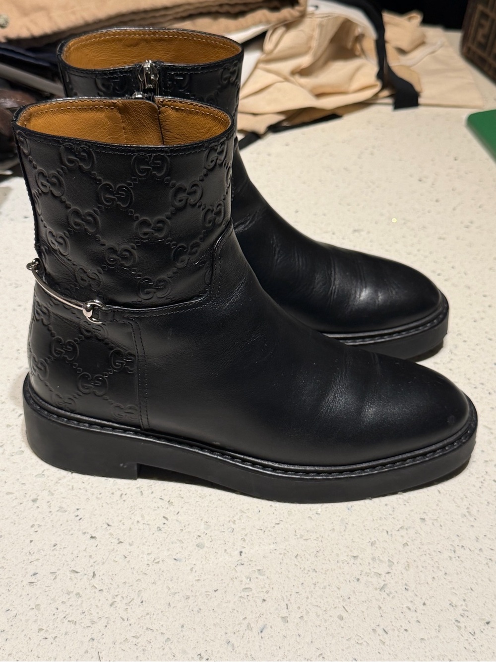 Gucci Black Leather Ankle Boots with Embossed GG